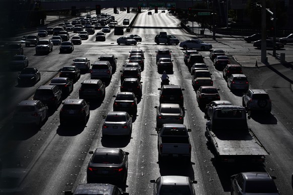 FILE - In this Thursday, April 22, 2021, file photo, cars wait at a red light during rush hour at the Las Vegas Strip, in Las Vegas. A study published Wednesday, May 22, 2024, says U.S. vehicles hit a ...