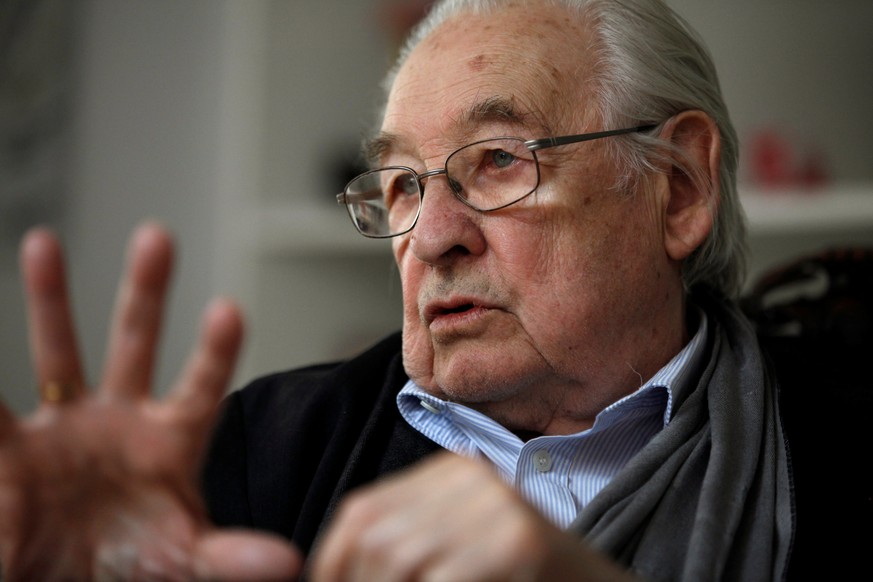 Oscar-winning Polish film director Andrzej Wajda gestures as he speaks to Reuters during an interview at Akson Studio office in Warsaw August 13, 2013. Wajda died Sunday night aged 90, according to lo ...