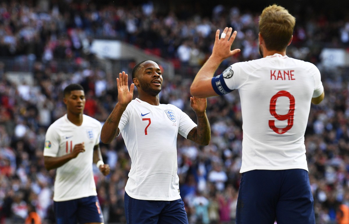epa07825979 England's Raheem Sterling (C) celebrates with teammate Harry Kane (R) after scoring the 3-0 lead during the UEFA EURO 2020 qualifying group A soccer match between England and Bulgaria ...