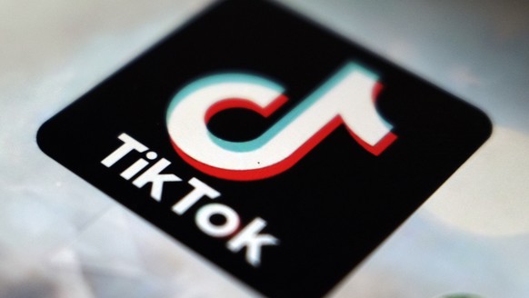 FILE - The TikTok app logo appears in Tokyo on Sept. 28, 2020. U.S. government bans on Chinese-owned video sharing app TikTok reveal Washington?s own insecurities and are an abuse of state power, a Ch ...