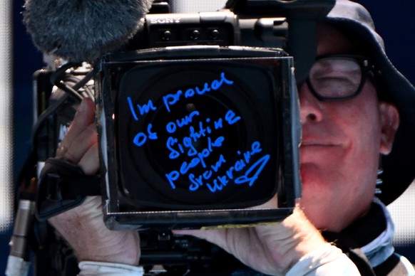 epaselect epa11099974 A view of a message written on the front of a camera by Dayana Yastremska of Ukraine, which reads: &#039;I?m proud of our fighting people from Ukraine&#039; following her Quaterf ...