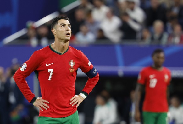 epa11461001 Cristiano Ronaldo of Portugal looks on during the UEFA EURO 2024 quarter-finals soccer match between France and Portugal, in Hamburg, Germany, 05 July 2024. EPA/ROBERT GHEMENT