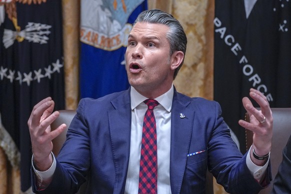 epa12565236 US Secretary of War Pete Hegseth answers a reporters question during a Cabinet meeting in the Cabinet Room of the White House in Washington, DC, USA, 02 December 2025. EPA/YURI GRIPAS / P ...