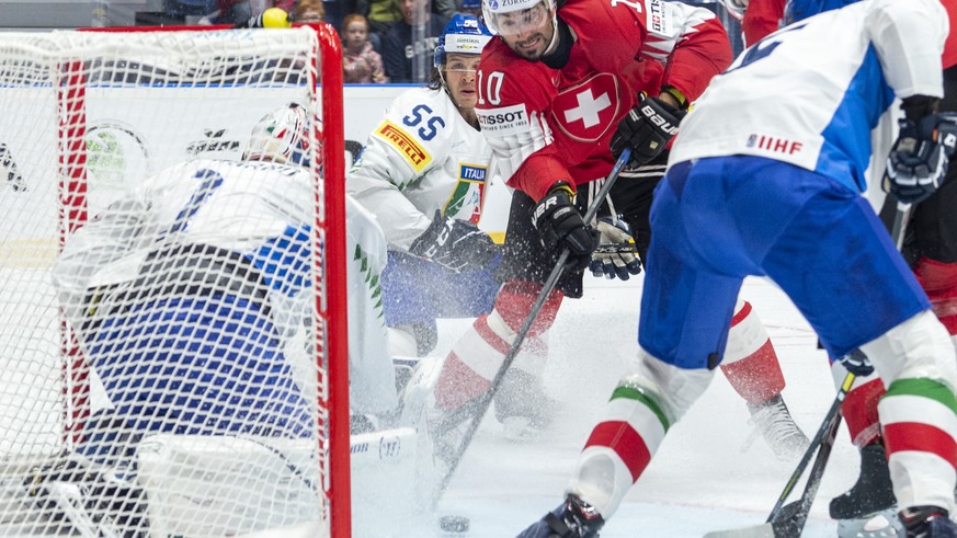 Italy`s Luca Zanatta, left, against Switzerland&#039;s Andres Ambuehl, during the game between Switzerland and Italy, at the IIHF 2019 World Ice Hockey Championships, at the Ondrej Nepela Arena in Bra ...