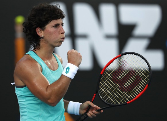 Spain&#039;s Carla Suarez Navarro clenches her fist while playing Hungary&#039;s Timea Babos during their second round match at the Australian Open tennis championships in Melbourne, Australia, Wednes ...