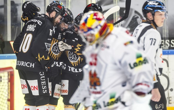 Luca Fazzini (HCL), center, celebrates the 2-0 goal with Jiri Sekac (HCL), left, and Ramon Tanner (HCL), right, during the regular season of National League Swiss Championship 2025/26 between HC Lugan ...