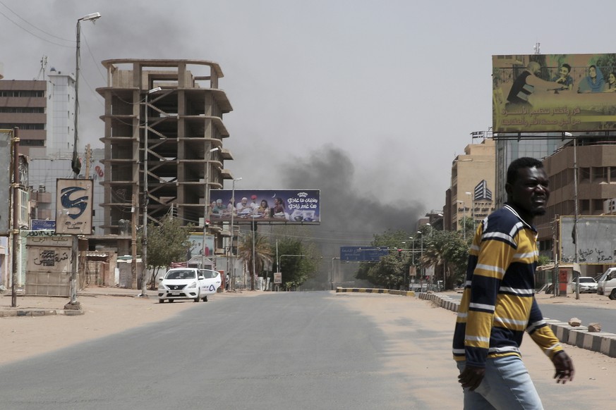 Smoke is seen rising from a neighborhood in Khartoum, Sudan, Saturday, April 15, 2023. Fierce clashes between Sudan?s military and the country?s powerful paramilitary erupted in the capital and elsewh ...