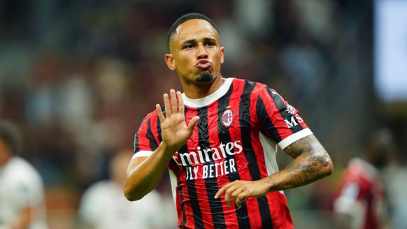 Noah Okafor AC Milan celebrates after scoring 2-2 during the Serie A soccer match between Milan and Torino at the San Siro Stadium in Milan, north Italy - Saturday, August 17, 2024. - Soccer . PUBLICA ...