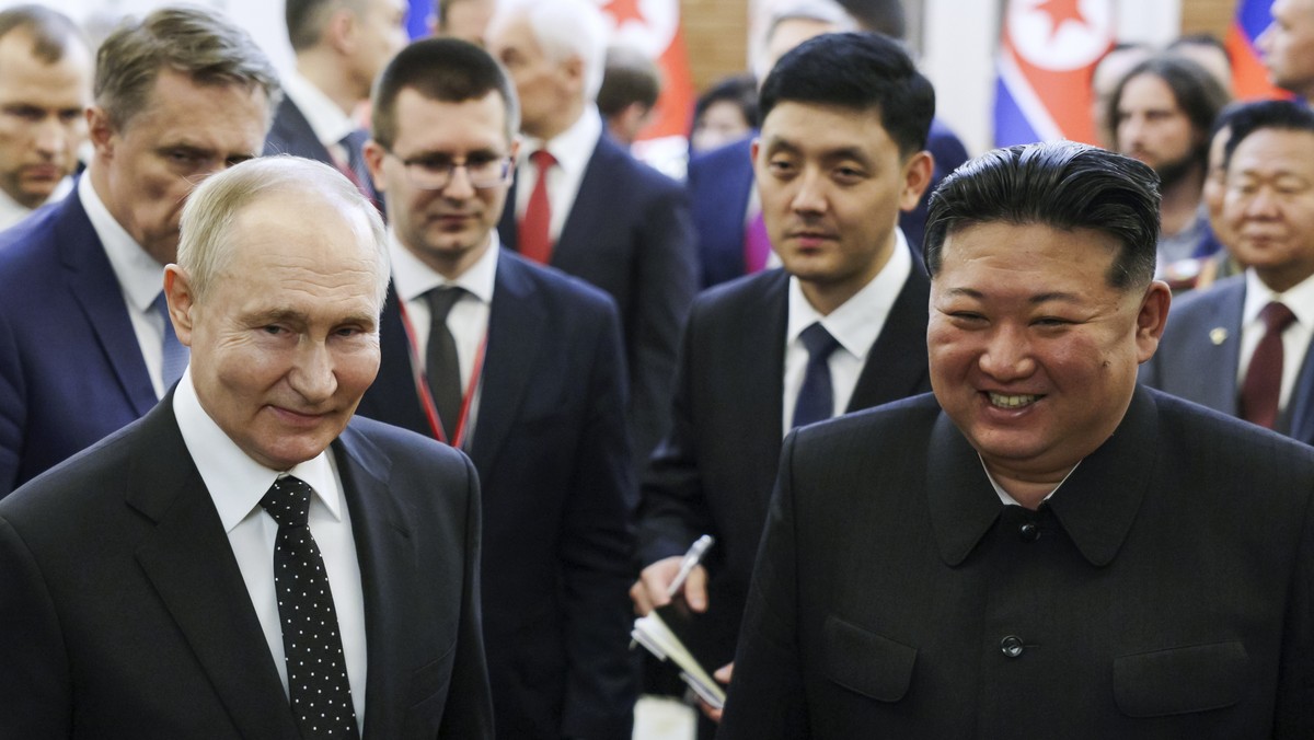 FILE - Russian President Vladimir Putin, left, and North Korea's leader Kim Jong Un smile together in Pyongyang, North Korea, on June 19, 2024. (Gavriil Grigorov, Sputnik, Kremlin Photo via AP, F ...