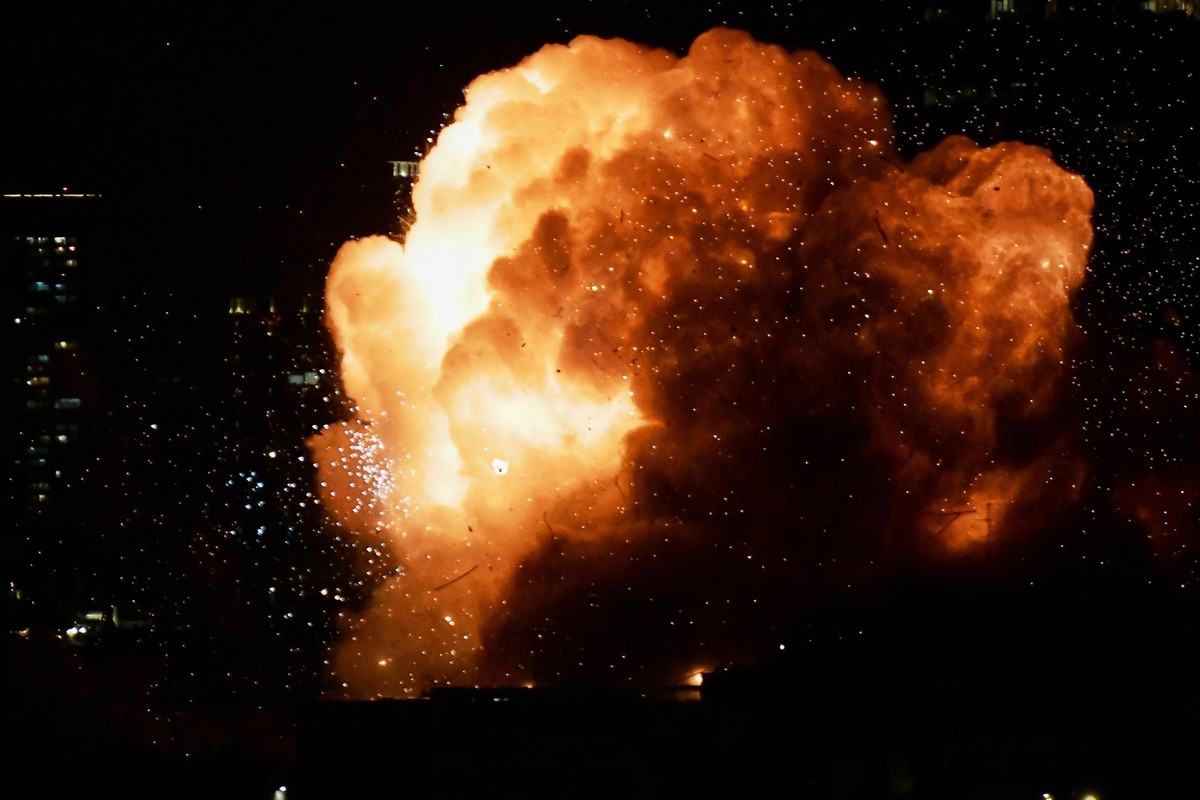 An explosion is seen as an Iranian missile directly hits a building in Tel Aviv, Israel, Saturday, Feb. 28, 2026. (AP Photo/Tomer Neuberg)
Israel Iran US