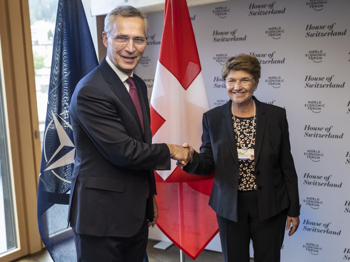 epa09971485 Jens Stoltenberg (L), Secretary-General, North Atlantic Treaty Organization, meets with Swiss Federal Councillor and defense minister Viola Amherd, for bilateral talks in the House of Swit ...
