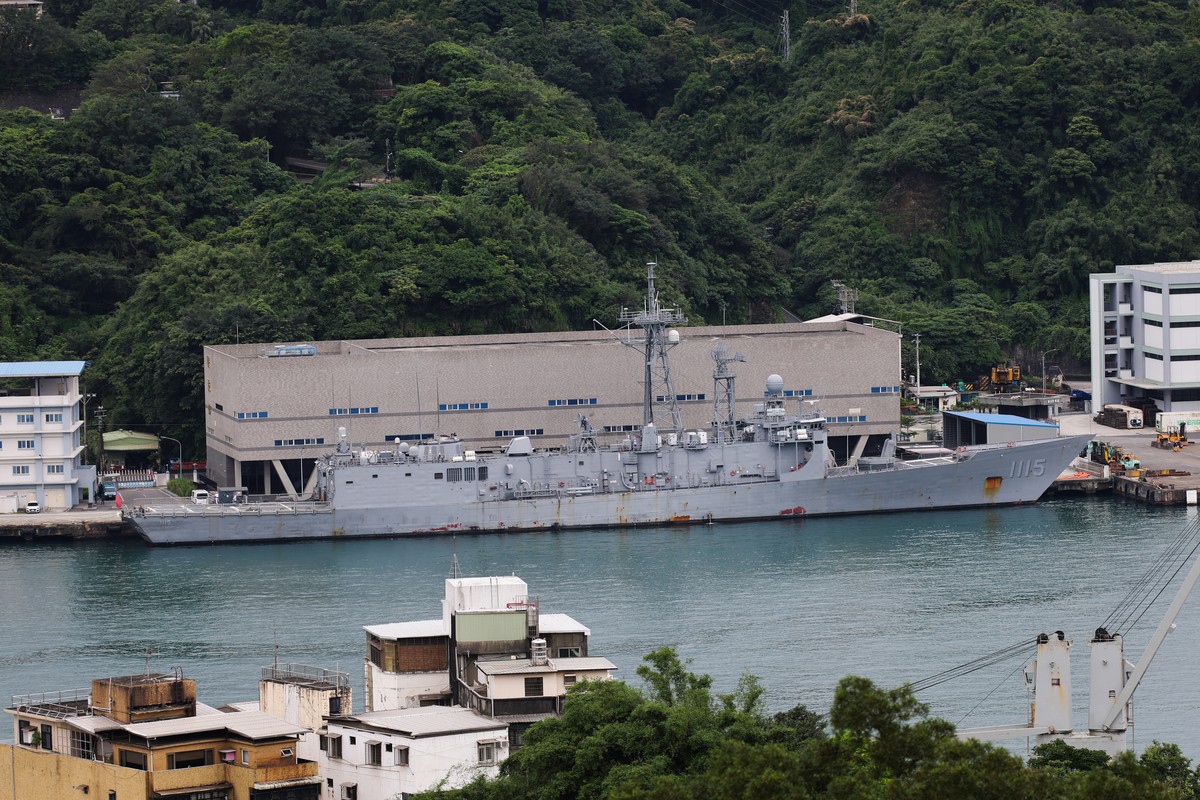 epa12952352 Taiwan Navys Cheng Kung-class guided-missile frigate is anchored in the port of Keelung city, Taiwan, 13 May 2026. During his state visit to China, US President Trump is scheduled to meet ...
