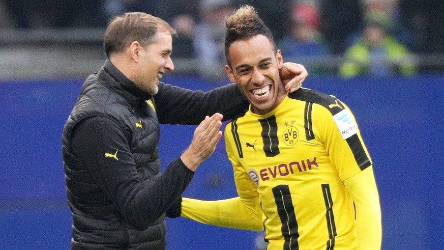 epa05618794 Dortmund&#039;s coach Thomas Tuchel (l) and Pierre-Emerick Aubameyang cheer after Aubameyang&#039;s 0:1 goal during the soccer match between Hamburger SV and Borussia Dortmund at Volkspark ...