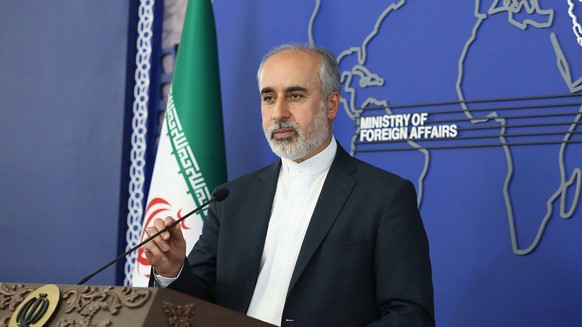 FILE - In this photo released on Thursday, Aug. 11, 2022, by the Iranian Foreign Ministry, Foreign Ministry spokesperson Nasser Kanaani speaks in Tehran, Iran. The Pentagon says U.S. military airstrik ...