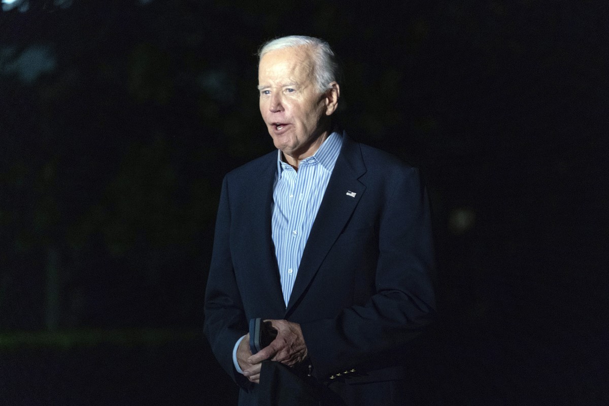 President Joe Biden talks to reporters as he arrives at the White House in Washington, Monday, Sept. 2, 2024, after campaign with Democratic presidential nominee Vice President Kamala Harris in Pittsb ...