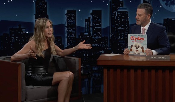 Pictures must credit: ABC Friends star Jennifer Aniston brought her pet rescue dog on a TV talk show to talk about a book he inspired her to write. The childrens book, called Clydeo Takes A Bite Out o ...
