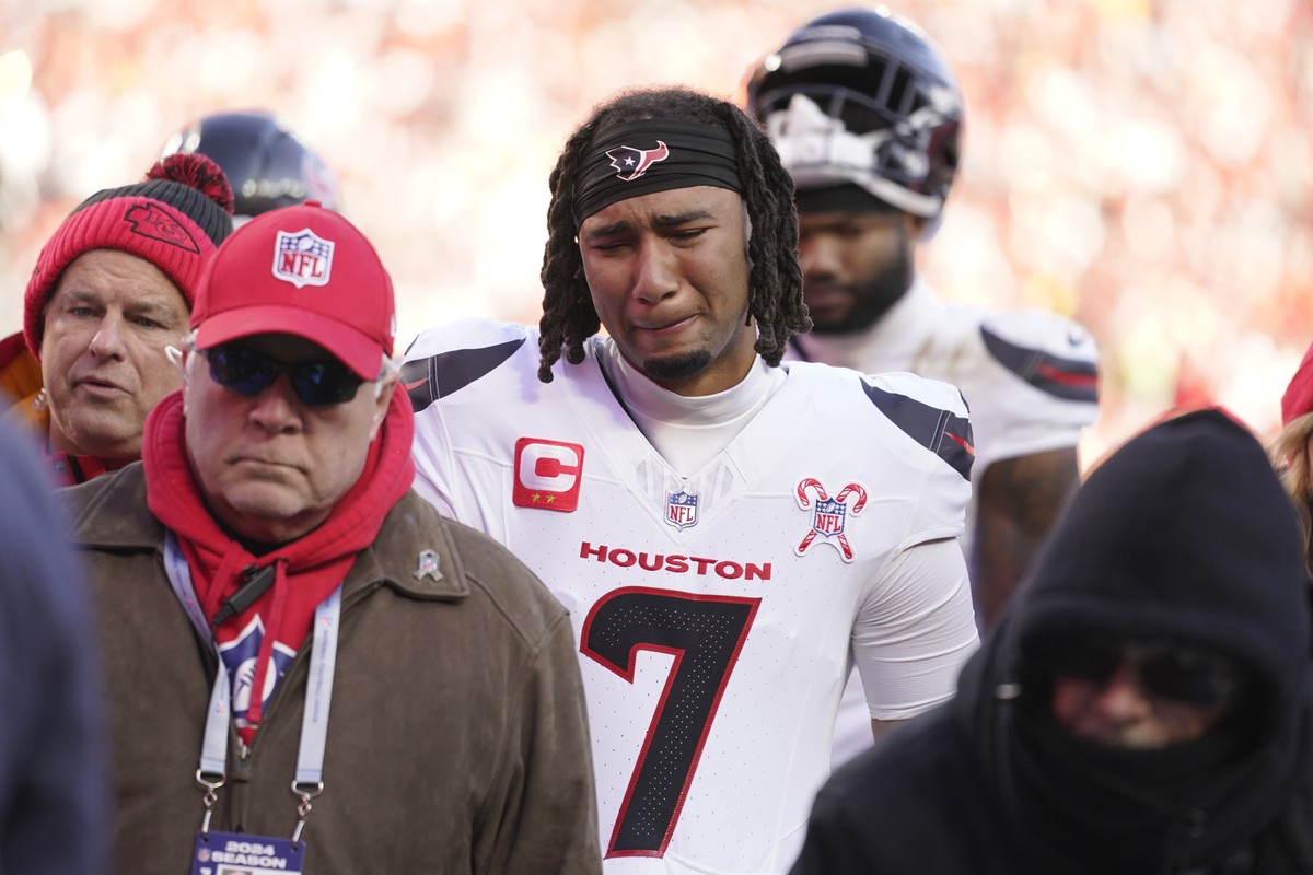 Houston Texans quarterback C.J. Stroud reacts after teammate Tank Dell was injured while catching a touchdown pass during the second half of an NFL football game against the Kansas City Chiefs Saturda ...