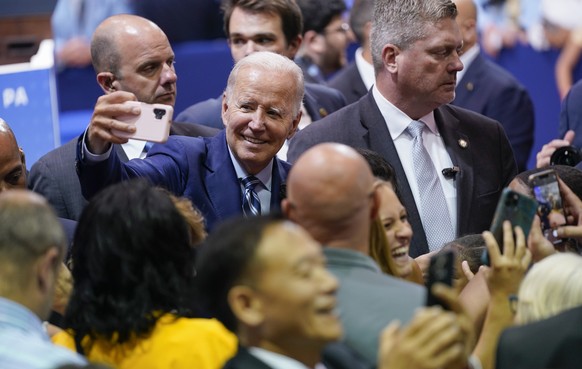 President Joe Biden takes a photo with supporters after speaking at the Arnaud C. Marts Center on the campus of Wilkes University, Tuesday, Aug. 30, 2022, in Wilkes-Barre, Pa. (AP Photo/Evan Vucci)
Jo ...