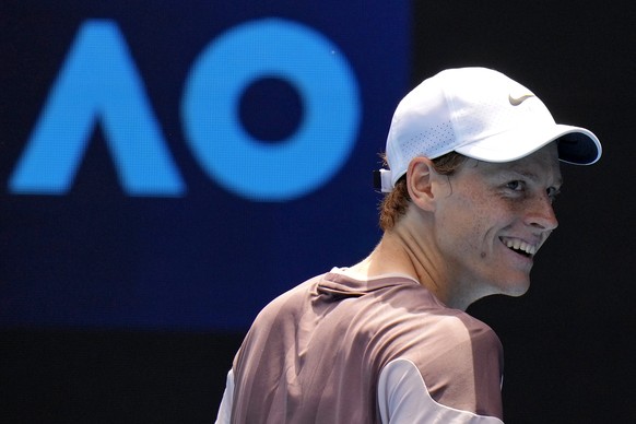 Italy&#039;s Jannik Sinner reacts during his first round match against Botic van de Zandschulp of the Netherlands at the Australian Open tennis championships at Melbourne Park, Melbourne, Australia, S ...