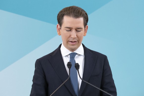 Former Austrian Chancellor Sebastian Kurz announces that he is quitting politics, two months after stepping down as leader amid corruption allegations, during a news conference in Vienna, Austria, Thu ...