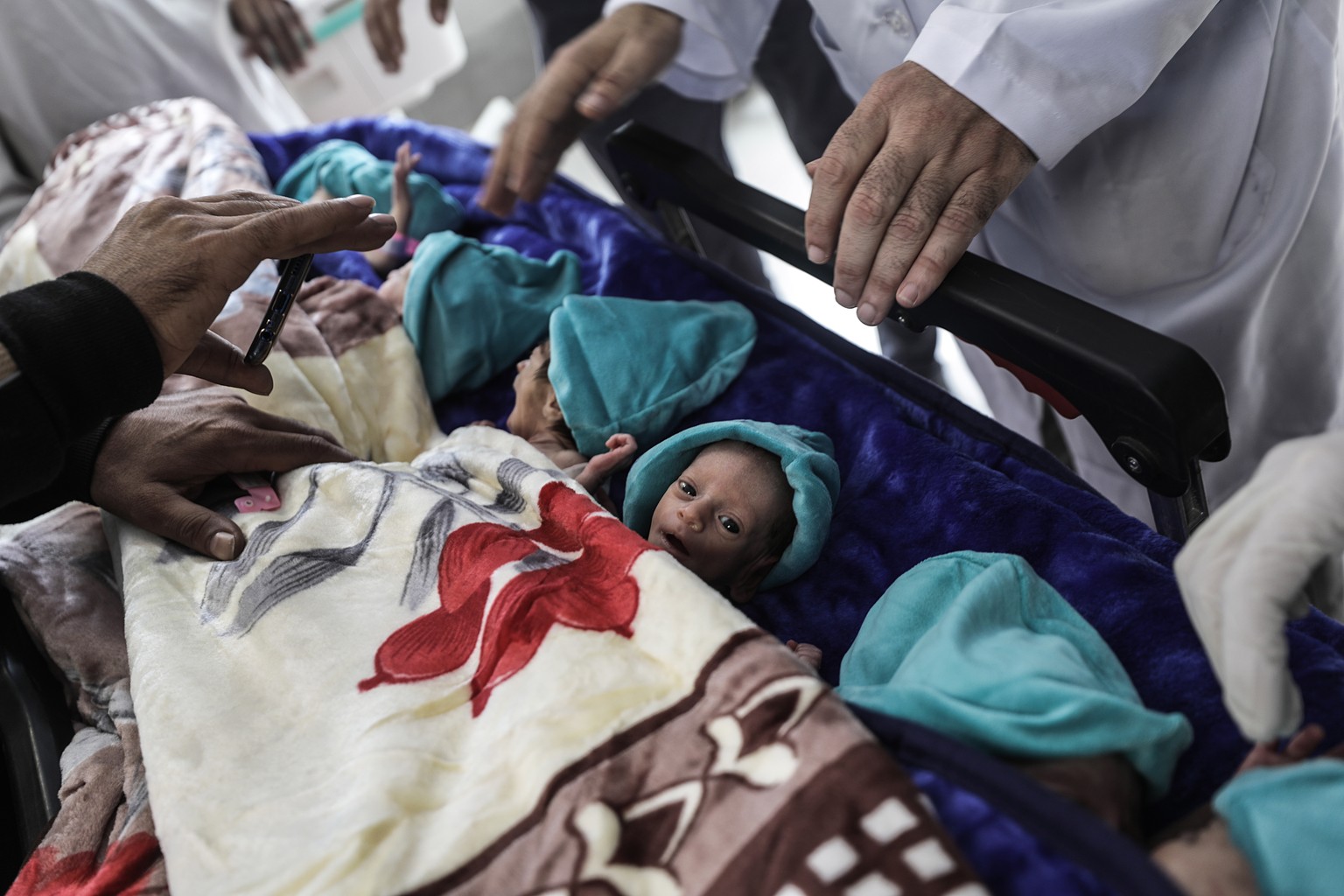 epa10986064 Health personnel prepare premature babies to be transferred to Egypt after they were evacuated from Gaza?s Al-Shifa hospital, at the Emirates Crescent Hospital in Rafah, southern Gaza, 20  ...