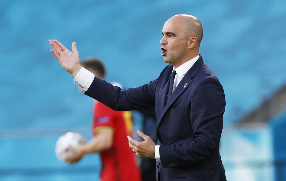 epa09306341 Belgium's head coach Roberto Martinez reacts during the UEFA EURO 2020 round of 16 soccer match between Belgium and Portugal in Seville, Spain, 27 June 2021. EPA/Julio Munoz / POOL (R ...
