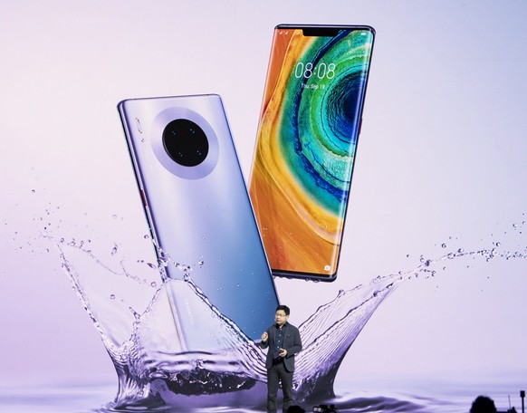 epa07853466 Richard Yu, CEO of Chinese Huawei Consumer Business Group, during the presentation of the the new Huawei Mate 30 and 30 Pro smartphones in Munich, Germany, 19 September 2019. EPA/LUKAS BAR ...