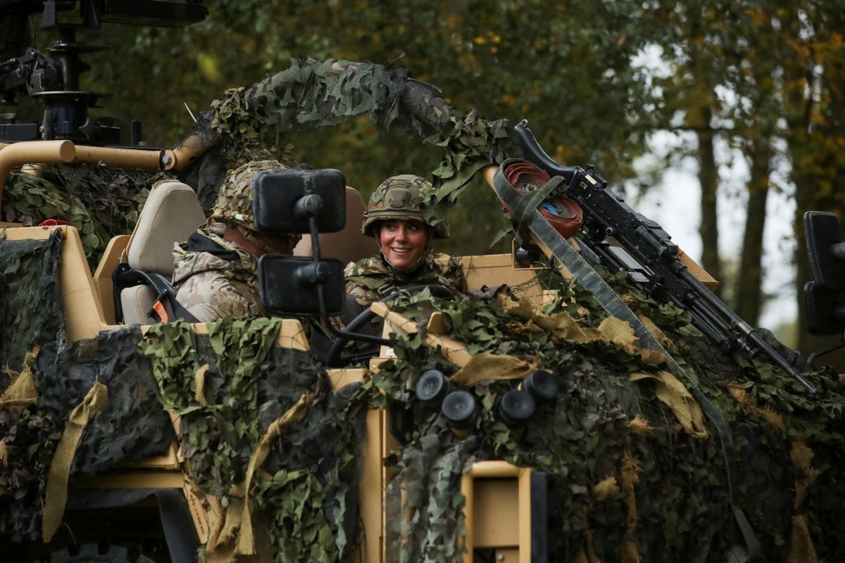 DEREHAM, ENGLAND - NOVEMBER 8: Catherine, Princess of Wales sits in an armoured vehicle as she visits The Queen's Dragoon Guards Regiment for the first time as their Colonel in Chief on November  ...