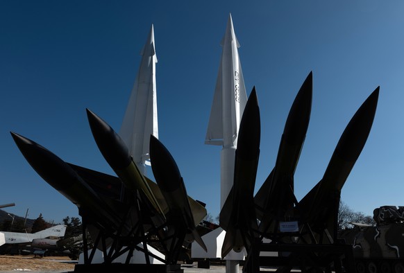 epa09679773 A general view of a South Korean Hyeonmu ballistic missile (back R) on display at the Korean War Memorial Museum in Seoul, South Korea, 12 January 2022. According to the Korean Central New ...