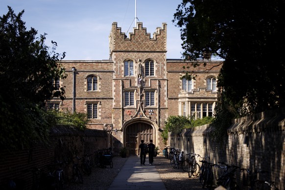 epa13155794 People walk outside Jesus College, where the resigned Professor Jason Arday worked, at the University of Cambridge in Cambridge, Britain, 07 August 2026. Professor of Sociology of Educatio ...