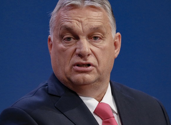 Hungarian Prime Minister Viktor Orban speaks during a joint press conference with French far-right leader Marine le Pen in Budapest, Hungary, , Tuesday, Oct. 26, 2021. (AP Photo/Laszlo Balogh)