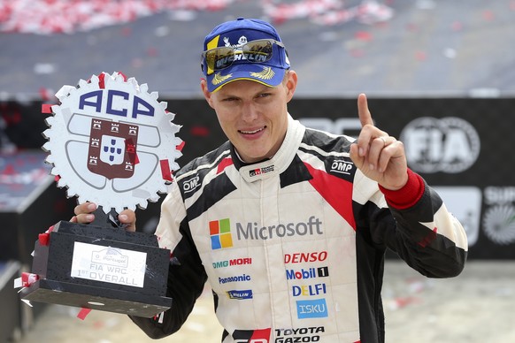 epa07620481 Estonian Ott Tanak of Toyota Yaris WRC team celebrates after winning the Rally de Portugal, part of the World Rally Championship (WRC) in Matosinhos, Portugal, 02 June 2019. EPA/JOSE COELH ...