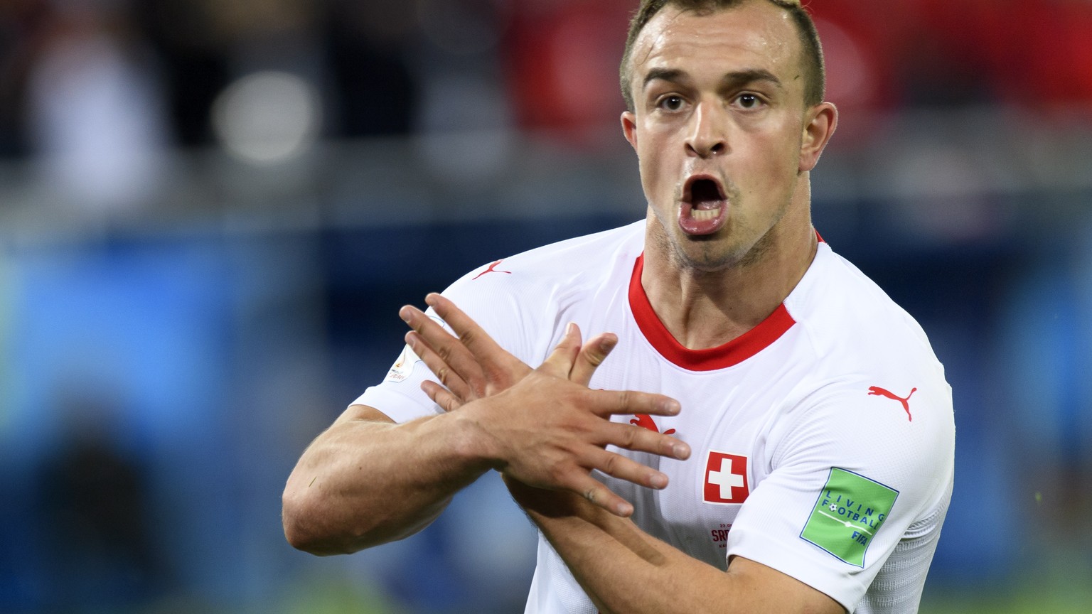 epa06832045 Switzerland&#039;s midfielder Xherdan Shaqiri celebrates after scoring the winning goal during the FIFA World Cup 2018 group E preliminary round soccer match between Switzerland and Serbia ...