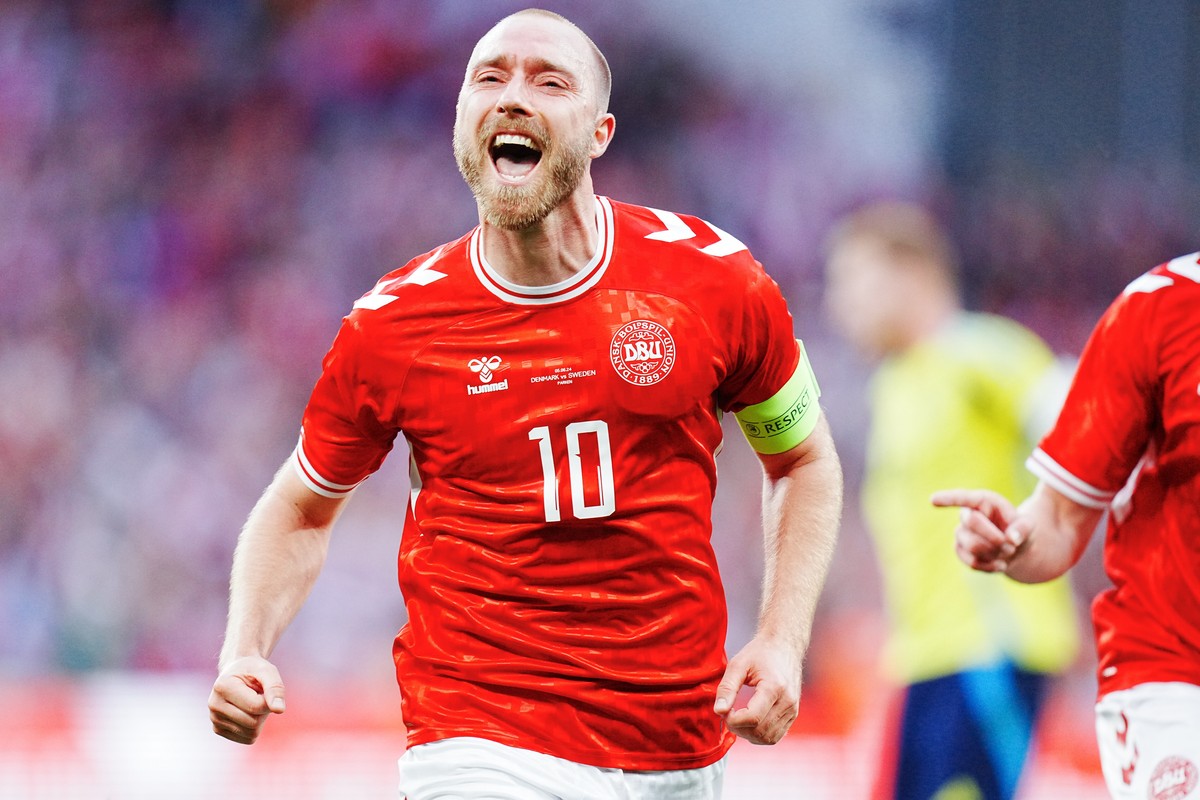 Denmark's Christian Eriksen celebrates after scoring his side's second goal during an international friendly soccer match between Denmark and Sweden in Copenhagen, Denmark, Wednesday June 5, ...
