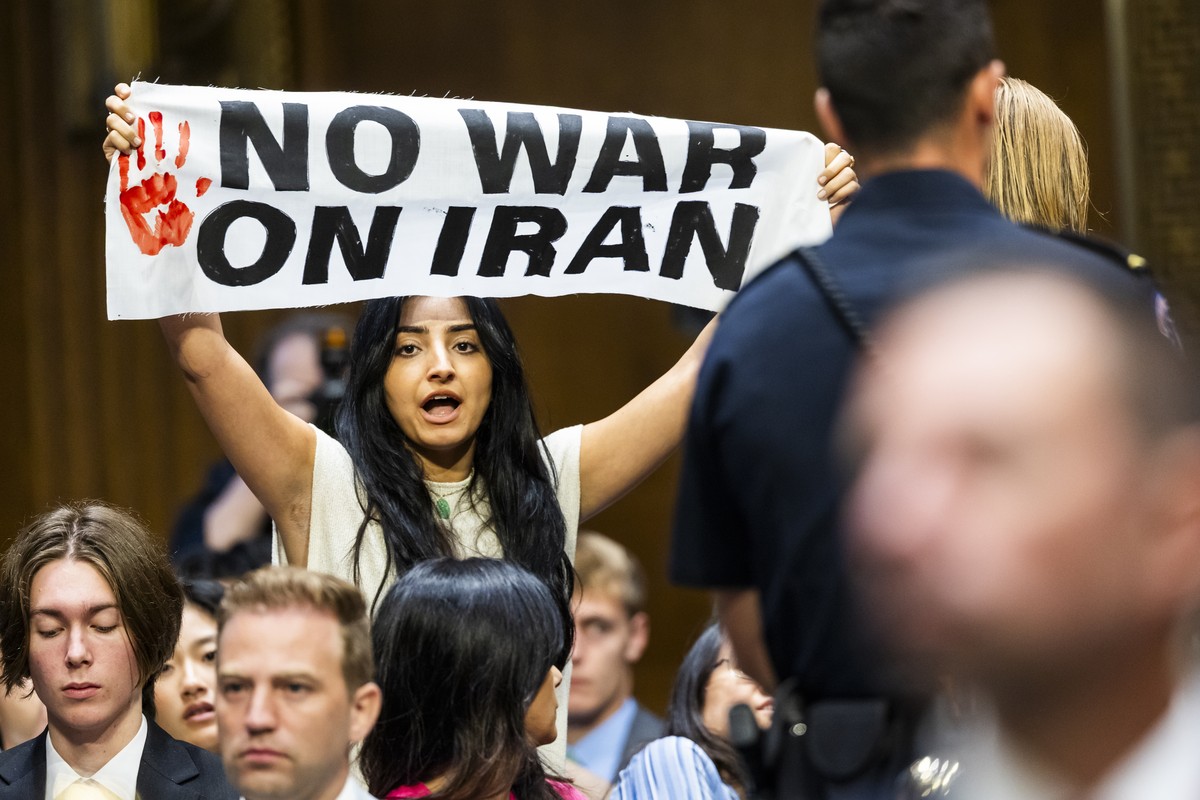 epaselect epa13125397 An anti-war protester stands up as US Secretary of Defense Hegseth and Chairman of the Joint Chiefs General John testify on the Defense Department's budget before the Senate ...