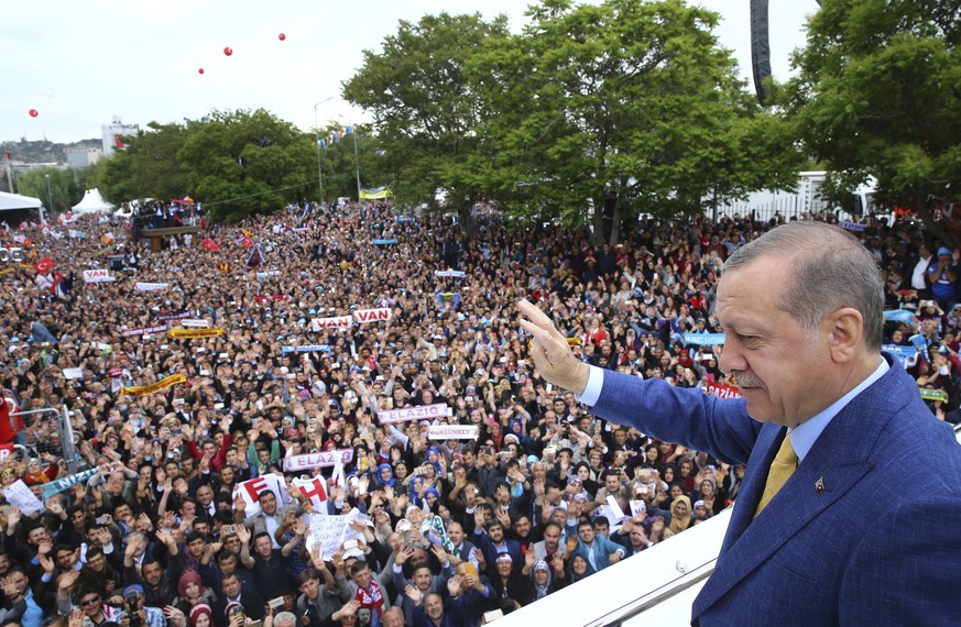 Turkey&#039;s President Recep Tayyip Erdogan waves to supporters as he arrives for a congress of the ruling Justice and Development Party (AKP) in Ankara, Turkey, Sunday, May 21, 2017. Turkey&#039;s r ...