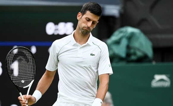 epa10036779 Novak Djokovic of Serbia during the men&#039;s first round match against Kwon Soon-woo of South Korea at the Wimbledon Championships, in Wimbledon, Britain, 27 June 2022. EPA/ANDY RAIN EDI ...