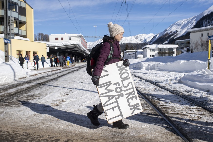 Swedish climate activist Greta Thunberg, 16, arrives at the Davos Dorf Main Station, in Davos, Switzerland 23 January 2019. Thunberg will attend the World Economic Forum (WEF) from 23 to 25 January. B ...