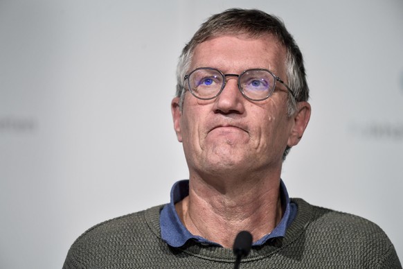 epa08764748 State epidemiologist Anders Tegnell of the Public Health Agency of Sweden listens during a news conference updating on the coronavirus pandemic (Covid-19) situation, in Stockholm, Sweden,  ...