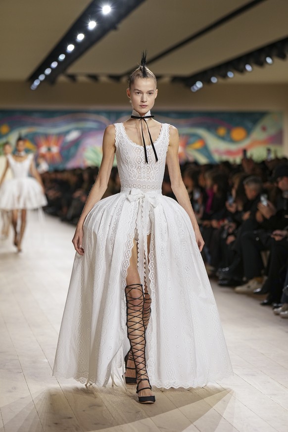 A model wears a creation as part of the Christian Dior Haute Couture Spring Summer 2025 collection, that was presented in Paris, Monday, Jan. 27, 2025. (AP Photo/Lewis Joly).