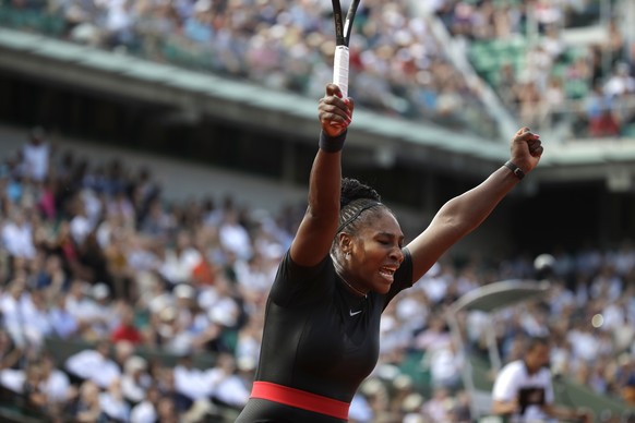 Serena Williams of the U.S. celebrates winning her first round match of the French Open tennis tournament against Krystina Pliskova of the Czech Republic at the Roland Garros stadium in Paris, France, ...