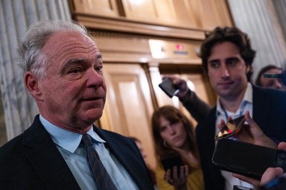 epa12517078 US Democratic Senator Tim Kaine speaks to press as he walks to the Senate Chamber to vote, at the US Capitol in Washington, DC, USA, 10 November 2025. The US Senate struck a deal on Sunday ...
