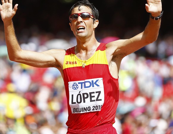 Miguel Angel Lopez of Spain celebrates winning the men&#039;s 20 km race walk final during the 15th IAAF World Championships at the National Stadium in Beijing, China August 23, 2015. REUTERS/Kai Pfaf ...