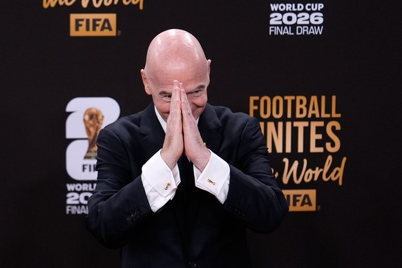 FILE - FIFA President Gianni Infantino gestures as he arrives to attend the draw for the 2026 soccer World Cup at the Kennedy Center in Washington, Friday, Dec. 5, 2025. (AP Photo/Julia Demaree Nikhin ...