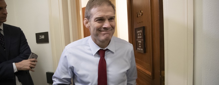 Rep. Jim Jordan, R-Ohio, a member of the House Oversight Committee, emerges from the hearing room after a day of compelled testimony from former FBI Director James Comey, on Capitol Hill in Washington ...