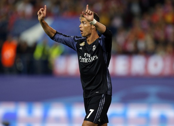 Real Madrid&#039;s Cristiano Ronaldo gestures during a Champions League semifinal, 2nd leg soccer match between Atletico de Madrid and Real Madrid, in Madrid, Spain, Wednesday, May 10, 2017 . (AP Phot ...
