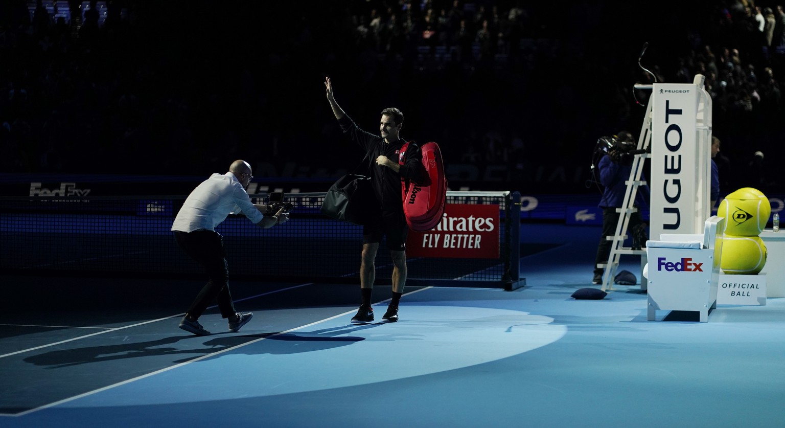 epa07997169 Roger Federer of Switzerland after winning his round robin match against Novak Djokovic of Serbia at the ATP World Tour Finals tennis tournament in London, Britain, 14 November 2019. EPA/W ...