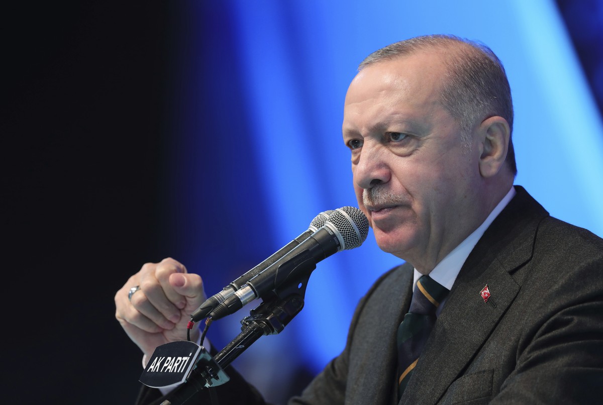 FILE - In this file photo dated Wednesday, March 24, 2021, Turkey's President Recep Tayyip Erdogan gestures as he delivers a speech during his ruling party's congress inside a packed sports  ...