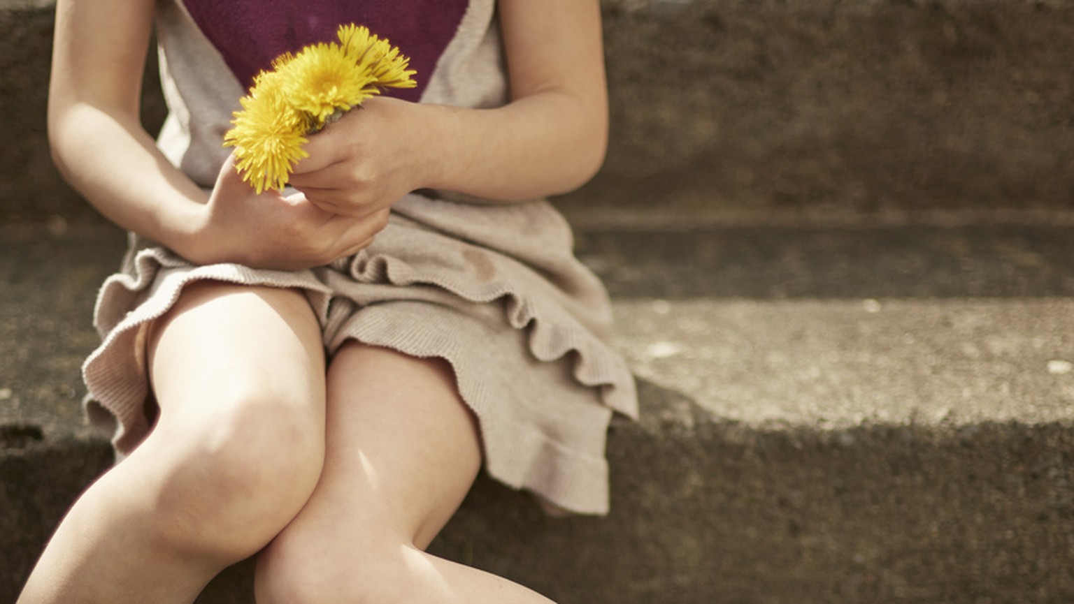 [ Symbolic Image, Posed Picture, Model Released ] - Girl sitting on the stairs, holding some flowers. - Girl, Child, flowers, heart, looking for love, legs closed, child abuse, looking for understandi ...