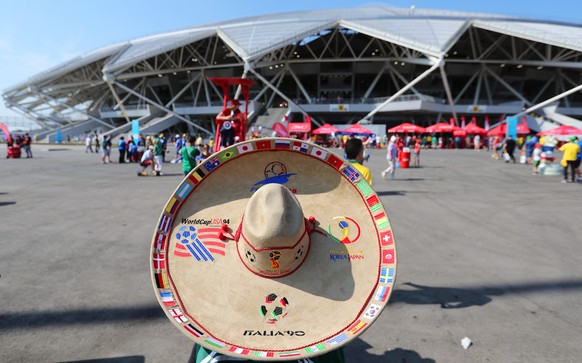 epa06857701 A supporter of Mexico arrives at the Cosmos Arena for the FIFA World Cup 2018 round of 16 soccer match between Brazil and Mexico in Samara, Russia, 02 July 2018. EPA/TATYANA ZENKOVICH